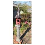 Decorative Birdhouse with Metal Roof on Stone Pede
