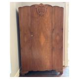 Wooden Armoire with Carved Crest and Metal Hardwar