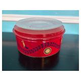 Red Tin Container with Glass Lid and Decorative Mo