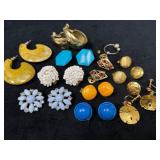 Twelve Pairs of Vintage Earrings and a Single Hoop
