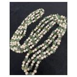 Two Long Strands of Serpentine and Pearls