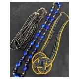 Three Beaded Necklaces with Blue, Gold, and Black