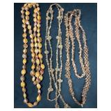 Three Extra-Long Seed Necklaces, 44' to 58' Long