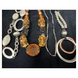 Four Unique Necklaces Featuring Mixed Materials an