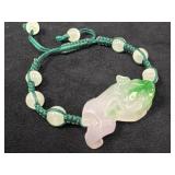 Carved Jade Foo Dog Pendant on Green Cord Bracelet