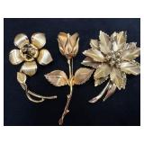 Three Gold-Tone Flower Brooches