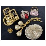 Brooches and Pins with Various Designs and Materia
