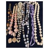 Wood, Shell, and Paper Jewelry Lot Featuring Neckl