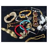 Bracelets Featuring Beads, Charms, and Metalwork