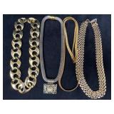 Four Costume Jewelry Necklaces in Gold-Tone and Si