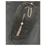 Two Necklaces: Multi-Strand Black Beaded and Silve