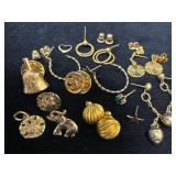 Tiny Gold-Tone Jewelry Pieces Featuring Earrings a