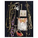 Jewelry Lot Including Necklaces, Earrings, and Bro