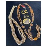 Two Necklaces, Two Pins, and Two Pairs of Earrings