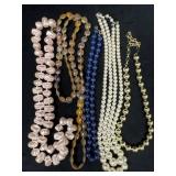 Five Bead Necklaces Featuring Various Materials an