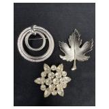 Three Silver-Tone Brooches Featuring Leaf, Crystal