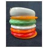 Six Vintage Plastic Bangles and One Hinged White P