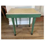 Green Wooden Table with Textured Top and Metal Edg