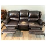 Brown Leather Reclining Sofa with Visible Wear