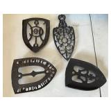 1800ï¿½s Four Cast Iron Sad Iron Trivets with Ornate