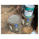 Sherwin-Williams and Behr Paint Cans