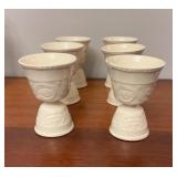4 Cream-Colored Ceramic Goblets with Relief Design