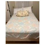 Full-Size Bed Frame With Mattress and Bedding