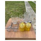 Clear and Yellow Glassware Including Pitchers, Jar