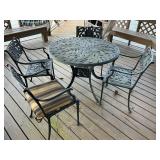 Cast Aluminum Patio Table with Four Chairs Featuri