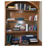 Books on Four Wooden Shelves