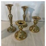 Four Brass Candlesticks of Varying Heights