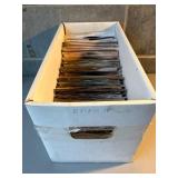 45s Vinyl Records in Storage Box