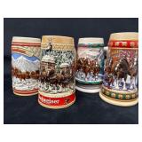 Four Anheuser-Busch Budweiser Holiday Steins with