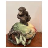 Ceramic Figurine of Monkey Sitting on Colorful Fru