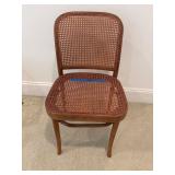 Wood and Rattan Cane-Back Chair With Curved Design