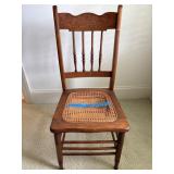 Wood Chair With Cane Seat and Decorative Backrest