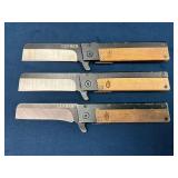 Three Gerber Folding Knives with Wood Handle Accen