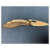 Buck Folding Knife with Black Textured Handle and