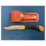 Buck Folding Knife with Wooden Handle and Leather