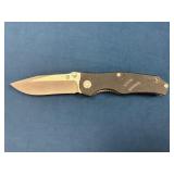 Folding Pocket Knife With Black Textured Handle an