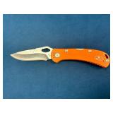 Buck Folding Knife with Orange Handle and Stainles