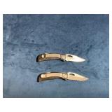 Folding Knives with Black Textured Handles and Par