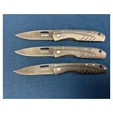 Three Gerber Folding Knives with Metal Handles