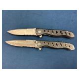 Two Folding Tactical Knives with Black Handles and