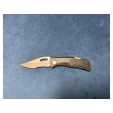 Folding Pocket Knife with Textured Handle and Part