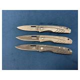 Three Gerber Folding Pocket Knives with Metal Hand