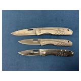 Three Gerber Folding Knives With Metal Handles