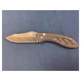Gerber Folding Knife with Textured Handle and Part