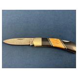 Damascus Steel Folding Knife with Decorative Wood