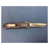 OTF Knife with Blade Holes and Engraved Handle Des